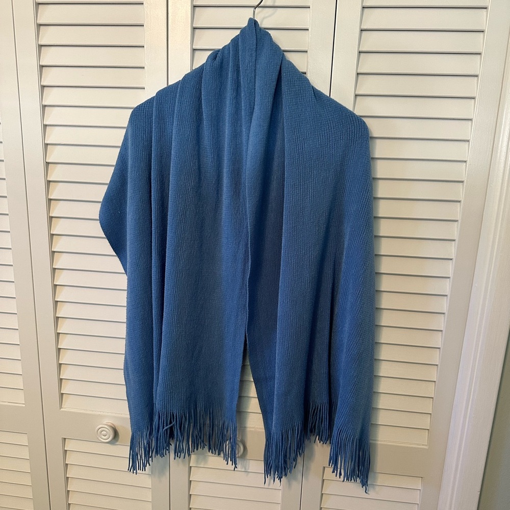 Fabulous sky blue wrap with fringe.